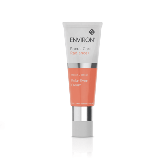 A photo of a skincare product in a white and peach-colored tube. The text on the tube reads, "Environ Focus Care Radiance+ intense C-Boost Mela-Even Cream." The advanced skincare formula is designed to address hyperpigmentation. The product is standing upright against a plain white background.
Product Name: Environ Focus Care Radiance+ Intense C-Boost Mela-Even Cream
Brand Name: Environ