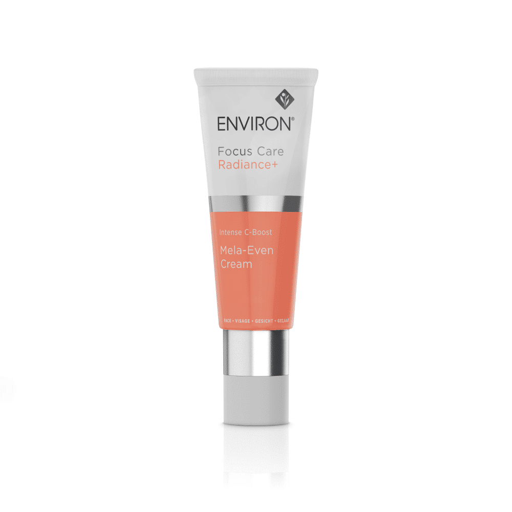 A photo of a skincare product in a white and peach-colored tube. The text on the tube reads, "Environ Focus Care Radiance+ intense C-Boost Mela-Even Cream." The advanced skincare formula is designed to address hyperpigmentation. The product is standing upright against a plain white background.

Product Name: Environ Focus Care Radiance+ Intense C-Boost Mela-Even Cream

Brand Name: Environ