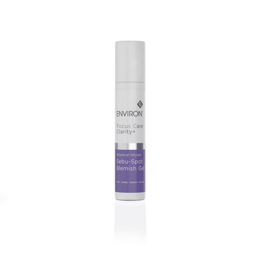 A white tube with a gray cap labeled "Environ Clarity+ Botanical Infused Sebu-Spot Blemish Gel." The lower part of the tube features a purple band with white text. Ideal for spot treatment, the background is plain white.